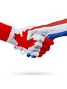 Flags Canada, Netherlands countries, partnership friendship handshake concept.