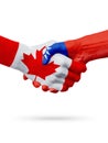 Flags Canada, Taiwan countries, partnership friendship handshake concept.