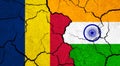 Flags of Chad and India on cracked surface