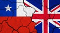 Flags of Chile and United Kingdom on cracked surface