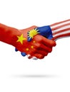 Flags China, Malaysia countries, partnership friendship handshake concept.