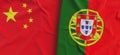 Flags of China and Portugal. Linen flag close-up. Flag made of canvas. Chinese flag. Beijing. Portuguese. State national symbols.