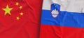 Flags of China and Slovenia. Linen flag close-up. Flag made of canvas. Chinese flag. Beijing. Lublyana State national symbols. 3d