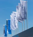 Flags of companies participating in the exhibition.