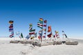 Nations flags landmark at the Uyuni Salt Flat, in Bolivia.
