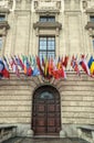 Flags of the countries of the European community on the facade of the building of the Organization for Security and Cooperation in