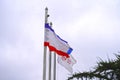 Flags of the Crimea and the Crimean railway against the sky