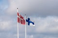 Flags of Demnark and Finland waving in the breeze