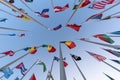 Flags of the different countries against the blue sky Royalty Free Stock Photo