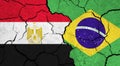 Flags of Egypt and Brazil on cracked surface