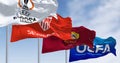 Flags of Europa League, Sevilla FC, AS Roma and UEFA waving