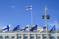 Flags of Europe and Finland waving together on the Presidential Palace in Helsinki Royalty Free Stock Photo