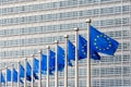 Flags of the European Union blowing in the wind in front of the European Commission in Brussels, Belgium Royalty Free Stock Photo