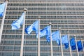 Flags of the European Union blowing in the wind in front of the European Commission in Brussels, Belgium Royalty Free Stock Photo