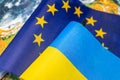 Flags of the European Union and Ukraine against the background of the globe, Economic and political concept, Cooperation and Royalty Free Stock Photo