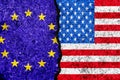 Flags of European Union and USA painted on cracked wall background/European Union versus USA conflict concept Royalty Free Stock Photo