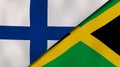 The flags of Finland and Jamaica. News, reportage, business background. 3d illustration