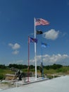 Flags flying and Canon display at VFW Post 4518, Sallisaw, OK
