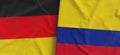 Flags of Germany and Colombia. Linen flag close-up. Flag made of canvas. German, Berlin. Bogota. State national symbols. 3d