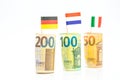 Flags of Germany, France and Italy euro bills on a white background.euro inflation.Changes in the budget.Inflation and Royalty Free Stock Photo