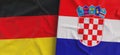 Flags of Germany and Slovakia. Linen flag close-up. Flag made of canvas. German, Berlin. Bratislava State national symbols. 3d