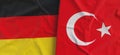 Flags of Germany and Turkey. Linen flag close-up. Flag made of canvas. German, Berlin. Turkish. State national symbols. 3d