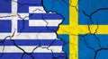 Flags of Greece and Sweden on cracked surface