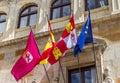 Flags on the historic Guzmanes palace in Leon