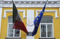 Flags of Italy and European Union flying under the main entrance to the building of Italian embassy in Kyiv