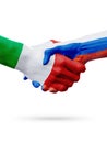 Flags Italy, Russia countries, partnership friendship handshake concept.