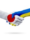 Flags Japan, Ukraine countries, partnership friendship handshake concept.