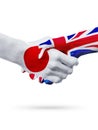 Flags Japan, United Kingdom countries, partnership friendship handshake concept.