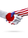 Flags Japan and United States countries, overprinted handshake. Royalty Free Stock Photo