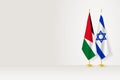 Flags of Jordan and Israel on flag stand, meeting between two countries