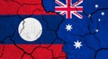 Flags of Laos and Australia on cracked surface