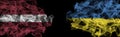 Flags of Latvia and Ukraine on Black background, Latvia vs Ukraine Smoke Flags