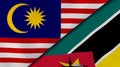 The flags of Malaysia and Mozambique. News, reportage, business background. 3d illustration
