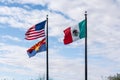 The flags of Mexico, United States, and the state of Arizona