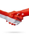 Flags Monaco, Turkey countries, partnership friendship handshake concept.