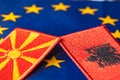 The flags of North Macedonia and Albania against the background of the Symbol of the European Union, The concept of the