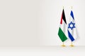 Flags of Palestine and Israel on flag stand, meeting between two countries