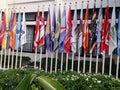 flags of political parties on their respective poles in front of the office of the independent election commission