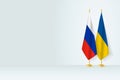 Flags of Russia and Ukraine on flag stand, meeting between two countries Royalty Free Stock Photo