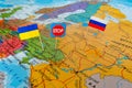 Flags of Russia and Ukraine on world map. Stop war concept, hot spot defending territory Royalty Free Stock Photo