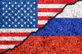 Flags of Russia and USA painted on cracked wall background/Russia versus USA conflict concept Royalty Free Stock Photo