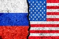 Flags of Russia and USA painted on cracked wall background/Russia versus USA conflict concept Royalty Free Stock Photo