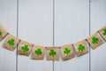 Flags with shamrocks clover on the wooden background Royalty Free Stock Photo
