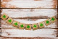 Flags with shamrocks clover on the wooden background Royalty Free Stock Photo