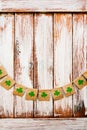 Flags with shamrocks clover on the wooden background Royalty Free Stock Photo