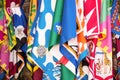 Flags of the Siena contrade districts, Palio festival background, in Siena, Tuscany Italy Royalty Free Stock Photo